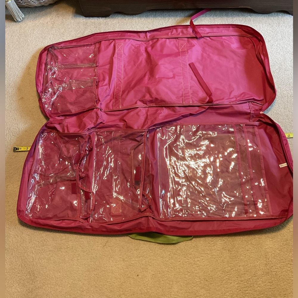 BUY 2 OR MORE $10 OR LESS GET 3rd LESSER FREE! 
Gift wrap storage tote